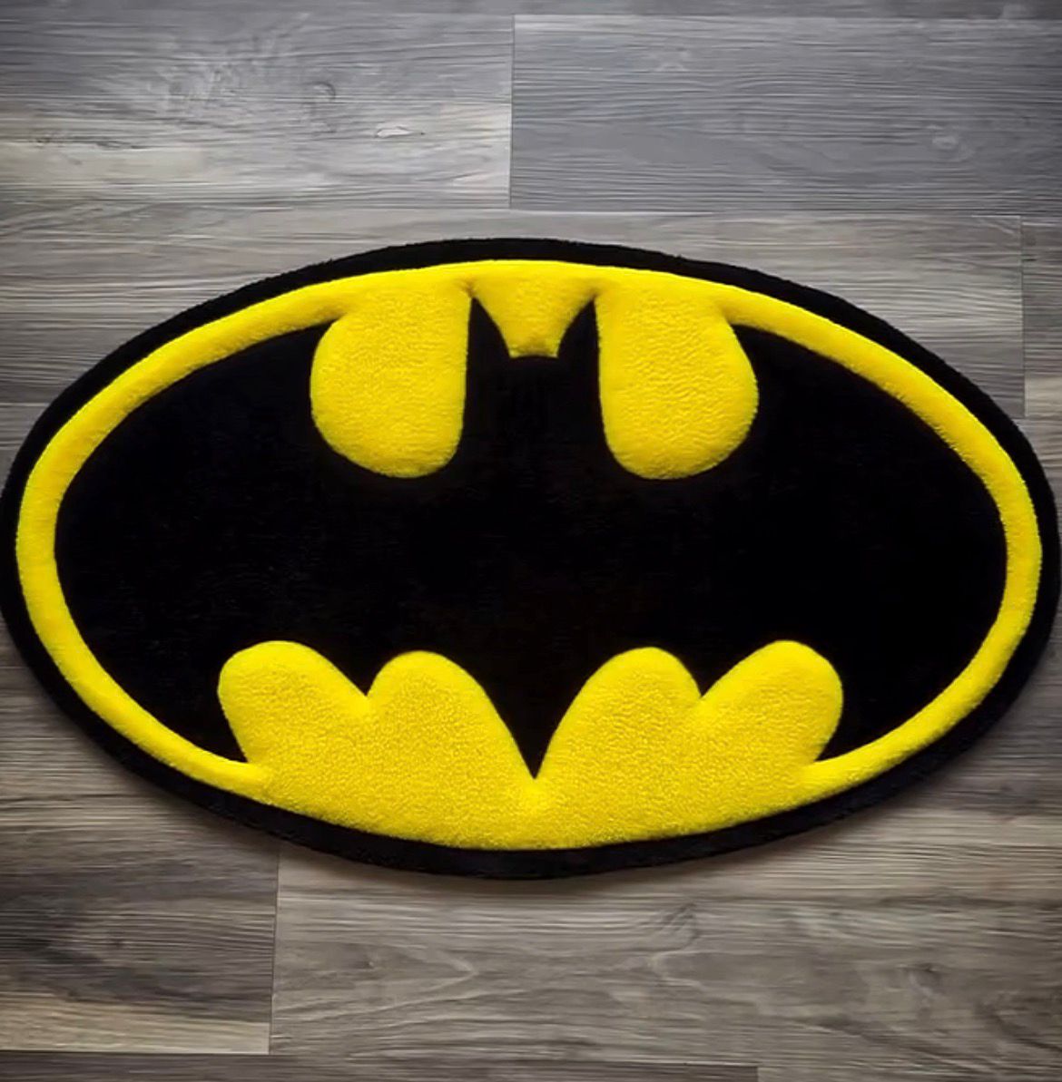 Premium Superhero Emblem Rug – Handcrafted Oval Anime Rug for Modern Interiors - ruggybuggy